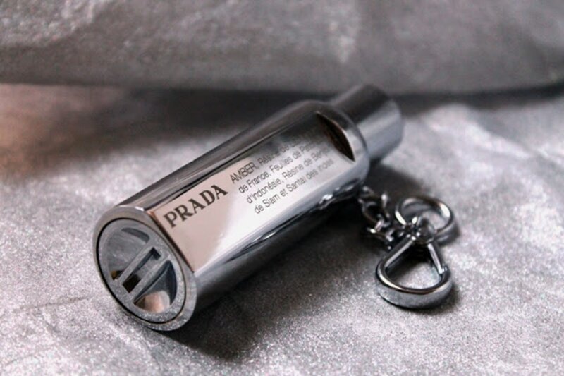 Amber by Prada metal perfume bottle, a rich spicy scent
