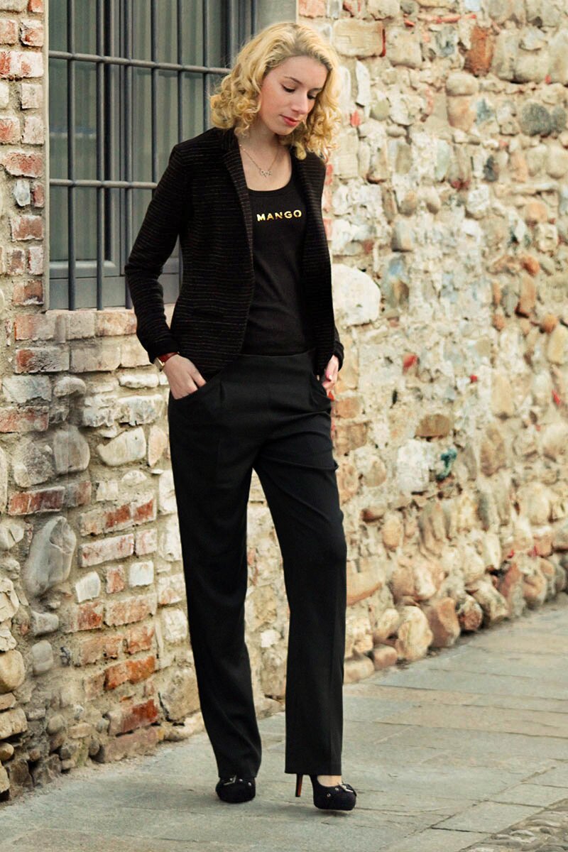 Fashion blogger Aurora Berill wearing a Bershka gold striped blazer with Iwie wide leg pants
