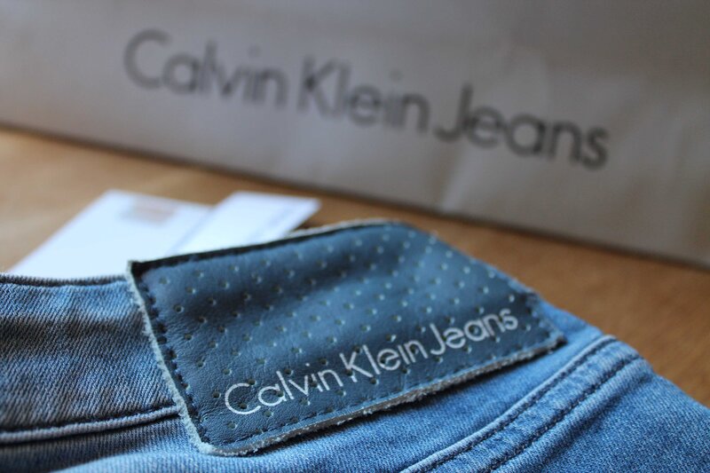 Calvin Klein washed off blue jeans