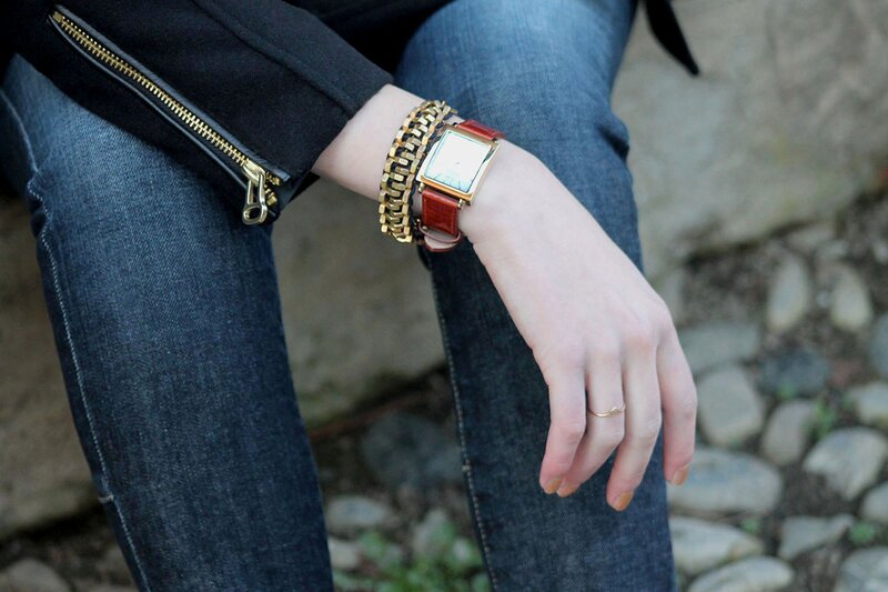 Fashion blogger Aurora Berill wearing a bracelet from Apache Rose London and Furla dress watch