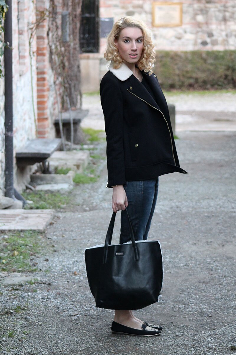 Fashion blogger Aurora Berill wearing a H&M sherpa collar jacket and Mango sherpa bag